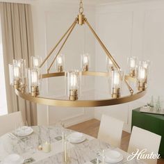 a large chandelier hanging over a dining room table with plates and glasses on it