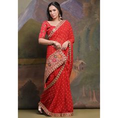 Red colored saree is made from georgette fabric which is highlighted with beautiful bandhej printed work as shown. Comes along with unstitched mono silk blouse piece which you can customise as per your design/style. Occasion - You can wear this saree for party, functions and fashionista. Note:- the actual product may differ slightly in color and design from the one illustrated in the images when compared with computer or mobile screen. Measurements: Saree : Georgette : 5.5 Mtrs Blouse : Georgett Bandhani Print Pre-draped Saree For Puja, Red Bandhani Print Art Silk Saree, Red Chanderi Saree With Bandhani Print, Red Saree With Bandhani Print, Red Bandhani Print Unstitched Saree, Red Bandhani Print Pre-draped Saree In Art Silk, Red Bandhani Print Saree For Diwali, Designer Bandhani Print Georgette Blouse Piece, Red Banarasi Silk Pre-draped Saree With Bandhani Print