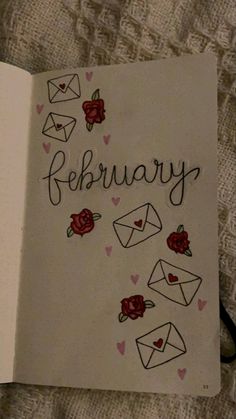 an open book with writing on it that says,'february'and envelopes