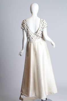 Cream 1960s Beaded Gown image 3 Elegant White Evening Dress For Reception, Cream Floor-length Wedding Dress For Ceremony, Elegant Cream Wedding Dress For Ceremony, Elegant Cream Wedding Dress With Pearl Embroidery, Elegant Cream Wedding Dress For Reception, Vintage Champagne Wedding Dress, Cream Silk Evening Dress For Wedding, Cream Wedding Dress With Fitted Bodice For Evening, Champagne Silk Evening Dress For Wedding