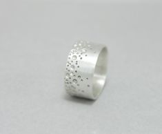 Bubble wide band ring sterling silver, dots, unisex, men ring I make this ring from 1mm (1/32 inch) sterling silver sheet, engraved it with a random pattern and brushed it. Each ring is individually made, so there won't be two rings exactly the same. This ring is 10 mm wide. If the size you prefer is not available, please contact me. Each ring is handmade to order and may slightly vary from the pictures. Please allow for subtle variations making each handmade piece unique. ----> All Internati Stacking Rings Ideas, Silver Casting, Bubble Ring, Random Pattern, Two Rings, Wide Band Ring, How To Make Rings, Men Ring, Wide Band Rings