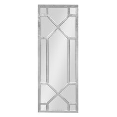 a mirror that is sitting on top of a white wall with an art deco design