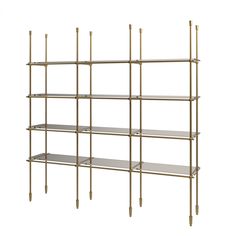 the shelf is made out of metal and has four shelves with gold bars on each side