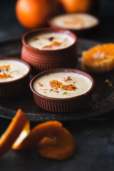 small desserts with orange slices on the side