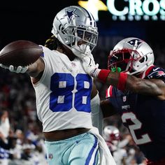 two football players in action on the field