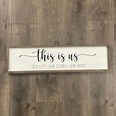 this is us our life story's our hoot sign on wood planks