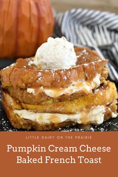 pumpkin cream cheese baked french toast on a black plate