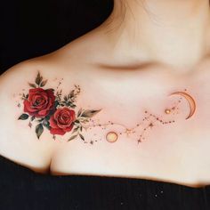 a woman's chest with roses and stars on it, as well as a crescent