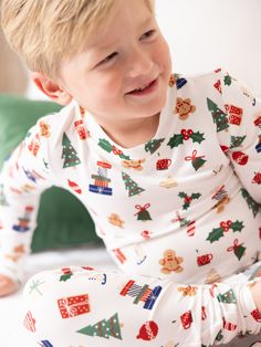 Celebrate the magic of the holiday season with our Family Pajamas. Perfect for creating sweet, lasting memories with your family, these matching pajamas bring a sense of togetherness and festive cheer. Made from our signature ButterSoft fabric, you'll stay cozy and comfortable, whether you're decorating the tree, baking cookies, or enjoying a holiday movie night together. Sizing Model is wearing YS. YS = 6/7 | Chest 22.75", Waist 20.75", Hips 22", Inseam 28" YM = 8 | Chest 24.5", Waist 22.5", Hi Playful Long Sleeve Christmas Sleepwear, Holiday Family Matching White Sleepwear, Holiday Playful Sleepwear, Playful Long Sleeve Sleepwear For Holidays, Family Matching Holiday Festive Sleepwear, White Family Matching Holiday Sleepwear, Family Matching Holiday Sleepwear In White, Family Matching White Holiday Sleepwear, White Holiday Sets For Pajama Party