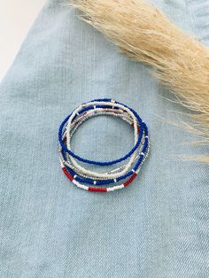 This patriotic bracelet set is so dainty. Stack these together, with other bracelets, or wear them by themselves! They are perfect for special events such as Independence Day, New Year's Day, and Memorial Day. ∙ ∙ ∙ ∙ ∙ ∙ ∙ ∙ ∙ ∙ ∙ ∙ ◆ MATERIALS ◆ * High-Quality Beading Elastic * Seed Beads of Various Colors ∙ ∙ ∙ ∙ ∙ ∙ ∙ ∙ ∙ ∙ ∙ ∙ ◆ SIZES ◆ This bracelet set is made to order so you can order it in whatever size you need. If you need a custom size please let me know. ∙ ∙ ∙ ∙ ∙ ∙ ∙ ∙ ∙ ∙ ∙ ∙ ◆ FI Blue Friendship Bracelets For 4th Of July Gift, Adjustable Blue Jewelry For 4th Of July, Adjustable Colorful Beaded Jewelry For 4th Of July, Blue Adjustable Bracelets For 4th Of July, Beaded Bracelet For 4th Of July, Blue Bracelet For 4th Of July, Patriotic Blue Friendship Bracelets, Blue Patriotic Bracelet For Friendship, Affordable Red Beaded Bracelet For 4th Of July