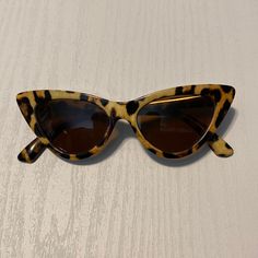 Leopard Print Retro Cat Eye Sunglasses Color Leopard Print Condition: Never Worn Runs Small Retro Brown Cat Eye Sunglasses For Beach, Retro Brown Cat Eye Sunglasses With Mirrored Lenses, Casual Brown Cat Eye Sunglasses With Polarized Lenses, Casual Brown Polarized Cat Eye Sunglasses, Brown Cat Eye Sunglasses For The Beach, Brown Cat Eye Sunglasses For Beach, Casual Brown Cat Eye Sunglasses, Summer Leopard Print Cat Eye Sunglasses, Retro Brown Cat Eye Sunglasses With Gradient Lenses