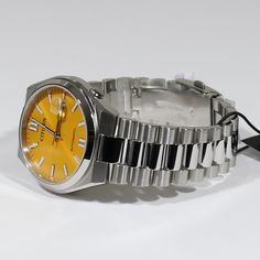 Item No. NJ0150-81Z Citizen Tsuyosa Automatic Men's Stainless Steel Yellow Dial Watch NJ0150-81Z Watch Features: Automatic Movement Caliber: 8210 21 Jewels 40 Hours Power Reserve Sapphire Crystal Stainless Steel Case Stainless Steel Bracelet Date Display Analog Display Fold Over Clasp Exhibition Case Back Push Pull Crown Luminous Hands Luminous Markers Yellow Dial Fixed Bezel Case Diameter: 40 mm Case Thickness: 11.7mm Water Resistance: 50 Meters Free Priority Shipping on all orders in continent Citizen Tsuyosa, Authentic Watches, Steel Bracelet, Sapphire Crystal, Fold Over, Stainless Steel Bracelet, Stainless Steel Case, Wrist Watch, Sapphire