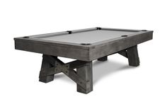 a pool table that is made out of wood and concrete, with one leg raised up