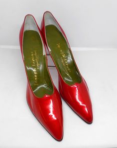 This is a fabulous and flashy pair of cherry red patent leather stiletto heeled, pointed toe pumps designed by Joseph Larose Exquisite Footwear of the 1950's vintage. The pair is new old stock, has never been worn, and is marked a Size 10 1/2. Joseph Larose was a Sicilian born shoe designer who opened his first shop in 1949, was in business for 50 years until 1999, when he died. He lived and worked in Jacksonville, Florida and was considered to be Jacksonville's Legendary Shoe Guru. He created o Fitted Patent Leather Court Shoes With Red Sole, Party Court Shoes With Glossy Finish And Pointed Toe, Red Glossy Heels For Party, Red Glossy Finish Heels For Party, Classic Pear-shaped Ruby Ring With Center Stone, Red Glossy Party Heels, Red Glossy Pointed Toe Heels, Red Vintage Pointed Toe Heels, Red 4-inch Kitten Heels For Spring