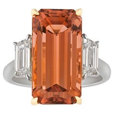 A highly unique peach tourmaline is set in this impressive ring. Displaying a distinctive orange-pink hue, the octagonal-cut gemstone features an elongated cut that makes the most of its 10.79-carat weight. The tourmaline is flanked on each side by trapezoid-cut white diamonds totaling approximately 0.89 carat and displaying D color and VVS clarity. Set in 18K white gold. Peach Ring, Jewelry For Sale, Paraiba Tourmaline, Rose Orange, Vintage Antique Jewelry, Garnet Ring, Rare Gemstones, Tourmaline Ring, Alexis Bittar