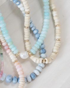 Our Denim necklace features stunning Denim Opal beads with 14k gold vermeil hardware. Elevate your style with this beautiful and versatile piece. Denim Necklace, Beachy Jewelry, Opal Beads, Stacked Jewelry, Summer Jewelry