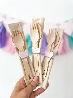 there are four forks with hearts on them and the words love - cutlery set for wedding and baby showers