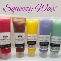 seven different colored candles are lined up in a row with the words sqeezy wax above them