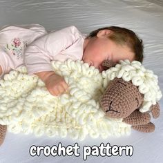 a baby sleeping on top of a blanket with a stuffed animal next to it that says crochet pattern