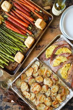 there are many different foods in the pans on the table and ready to be cooked