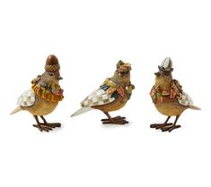 three ceramic birds with hats on their heads