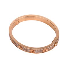 Guaranteed authentic Cartier Diamond Love bracelet featured in 18k Rose Gold.Set with 204 brilliant-cut diamonds.Total carat weight is 1.99Chic and instantly recognizable.Bracelet has signature stamps inside. Comes with signature brown pouch, signature Cartier gift box and papers.Excellent condition. A few very faint light hairline marks on one side can be polished out.final saleSIZE 16 CONDITION:EXCELLENT +++++ Luxury Cartier Diamond Bracelet Brilliant Cut, Luxury Cartier Brilliant Cut Bracelets, Cartier Diamond Bracelet Gift, Luxury Cartier Diamond Bracelet With Brilliant Cut, Cartier Diamond Accented Bracelets As Gift, Cartier Bracelets With Diamond Accents For Gift, Rose Gold Bracelets With Pave Setting For Gift, Cartier Diamond Jubilee Bracelet, Cartier Diamond Jubilee Bracelet Gift