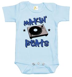 Rapunzie's trendy and music-inspired Baby Onesie with a cool DJ twist! This onesie is all about groove and rhythm, featuring a graphic of a DJ turntable with the caption "Makin' Beats." Your little one will rock the world with their undeniable style and love for music. Key Features: Premium Quality: Crafted from 100% cotton, this baby onesie ensures utmost comfort and breathability, allowing your baby to move and play with ease while keeping their delicate skin cozy and irritation-free. Short Sl Unisex Casual Onesie With Graphic Print, Casual Onesie With Graphic Print, Gender-neutral, Casual Graphic Print Onesie For Playtime, Unisex Graphic Print Onesie For Playtime, Fitted Blue Onesie With Letter Print, Music Key, Dj Turntable, Love For Music, Future Music