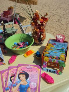 there are many items on the table at this beach party