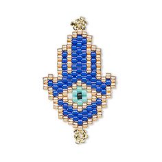 a blue and gold hamsah broochle with an evil eye on it