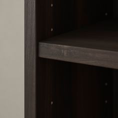 a close up view of a shelf in a room with no one on it or the shelves