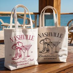 two bags sitting on top of a wooden table next to each other with drinks in them