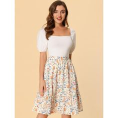 Made of floral-printed fabric, this midi skirt is high-waisted featuring an A-line silhouette. This flowy midi skirt with a tiered design and vintage allover floral prints. Featuring an A-line and tiered details, it is a summer casual skirt to be paired well with a top and sandals for a cute day look and with a stylish T-shirt and vintage high heels for a charming inspired look. Casual Summer Skirt, Midi Skirt White, Flowy Midi Skirt, Vintage High Heels, Floral Print Midi Skirt, High Waist Long Skirt, Ruffle Fabric, Skirt Trends, Long Skirts For Women