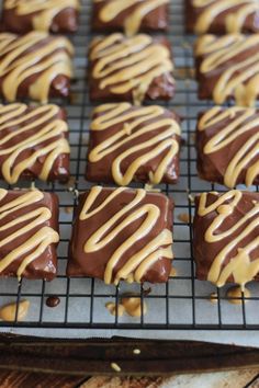 chocolate and peanut butter squares are on a cooling rack, ready to be baked in the oven