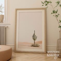 there is a framed photograph on the wall next to a potted plant and a radiator