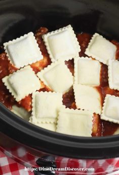 ravioli and sauce in the crock pot ready to be cooked for dinner or lunch