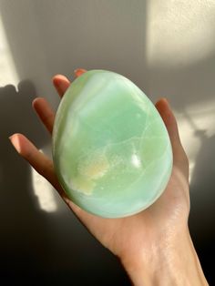 AAA-quality collector's pistachio calcite egg with stand, sourced from Peshawar, Pakistan. Weighs 1.112 kg Measures 4.5" x 3.5" *Please be sure to view my shop announcement section prior to making a purchase from my shop!  **For US buyers, the defaulted delivery option upon checkout is Small Packet USA Air, which does not include tracking. If tracking is preferred, shipping can be upgraded to Tracked Packet, Expedited Parcel, or XpressPost. Calcite is a very common and widespread mineral with hi Peach Calcite Meaning, Crystal Wishlist, Pistachio Calcite, Summer Candy, Peshawar Pakistan, Rock Plants, Green Calcite, Caribbean Calcite