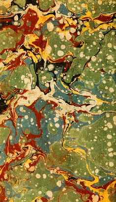 an abstract painting with lots of colors and spots on it's surface is shown