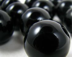 Offered are 12 wonderful BLACK opaque and smooth beads! The beads are 20mm in diameter and have a 2mm hole. These are so cute and so perfect for your girls' chunky necklaces and jewelry! Please take a look around Special Sparkles for all of your bling needs for your girls' chunky necklaces and bracelets! Craft Beads, Bubblegum Necklace, Single Bead, Bubblegum Beads, Rhinestone Bow, Chunky Beads, Bead Kits, Resin Flowers, Pink Beads