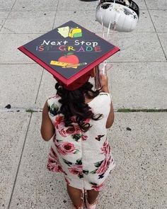 a girl with a graduation cap on her head