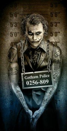 the joker is holding a sign that says gotham police