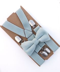 "This beautiful Fresh Sage bow tie & suspenders set is a perfect choice for a holiday, wedding, groomsmen, best man, ring bearer outfit, birthday celebration or any other special occasion! SIZING:    SMALL: 6mo-4yrs  * Bow Tie: 4 in wide  * Suspenders: Adjustable from 16\" to 27\" (38 cm - 68cm), X- back.   MEDIUM: 5yrs-10yrs   * Bow Tie: 4in wide  * Suspenders: Adjustable from 20\" to 32\" (50cm-85cm),  X- back.   LARGE: 10 yrs-18yrs (up to 5'6\")  * Bow Tie: 4.5in wide  * Suspenders: Adjustable from 24\" to 47\" (62 cm - 120 cm), X- back.   ADULT (5'7\" - 6'3\"):  * Bow Tie: 4.5\" wide  * Suspenders: Adjustable from 27\" to 55 \" (70 cm - 140 cm), X- back. HOW TO MEASURE:  Please note the ages listed above are approximate. They are listed so that you may obtain an accurate size while mea Elegant Party Belt With Bow, Adjustable Bow Tie Back Belt For Wedding, Adjustable Wedding Belt With Bow Tie Back, Agave Wedding, Sage Bow Tie, Wedding Suspenders, Tie And Suspenders, Bow Tie For Men, Suspenders Wedding