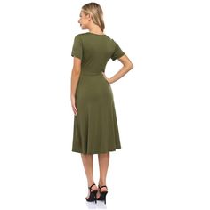 This dress features a V-neck design for a stylish and flattering look. Ballet Dress, Green Style, Women Midi, Purple Green, Green Fashion, Bodycon Mini Dress, Vest Dress, Flared Sleeves, Wine Red