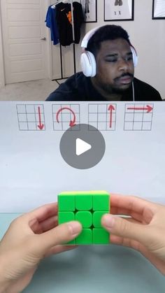 a person is playing with cubes and headphones