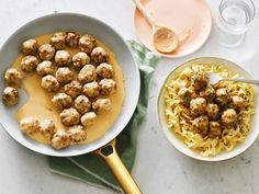 two plates with meatballs and noodles on them