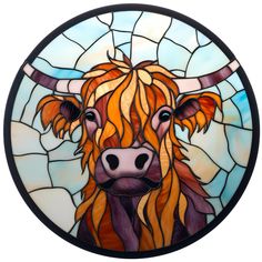 a stained glass window with a cow's head on it