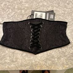 Bought This But It Doesn’t Fit Laying Flat It Is 15” But Can Stretch An Extra 4” It Has Fabric Underneath. Fitted Black Corset Belt For Festival, Fitted Black Corset For Festival, Black Fitted Corset For Festival, Black Fitted Corset Belt For Festivals, Black Gothic Corset With Straps, Skull Corset Plus Size, Black Lace Overbust Corset, Black Lace Gothic Corset Belt, Gothic Black Corset With Zipper Closure