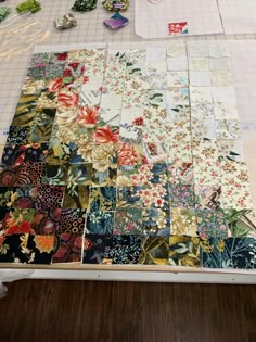 several pieces of fabric laid out on a table