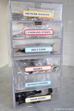 the drawers are organized and labeled with different types of things to put in them for storage