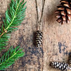 I live in upstate NY, and pinecones are everywhere🌲 The main purpose of a pinecone is to keep the seeds of the tree safe, which is why it is shaped with it's scales closely in and down. As with most things in nature, they're beautiful and perfectly designed This pendant is made out of antique brass and copper. Up close, it's very realistic looking and larger than the other designs I've seen on Etsy. The pendant measures about 2 inches in height and looks amazing on a long chain so you can fidge Pine Cone Necklace, Pine Cone Jewelry, Things In Nature, Pinecone Necklace, Tree Necklace, Tiny Studs, Upstate Ny, Nature Inspired Jewelry, Tree Farms