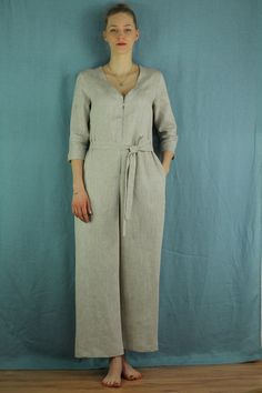 "Linen jumpsuit with belt and 2 pockets in natural color, perfect for casual wear and suitable for any occasion in any season Details: - 100% natural linen produced in Europe ; - medium weight (180 gram per square meter); - color: natural, could be any from our colors catalog (color samples at the photo); Made to order, approximately a few days, If you have any questions please message me and I will be glad to answer. Size guide : Size XS Bust: fits bust around 33\"-34\"/ 84-88 cm Waist: fits wa Spring Linen Belted Jumpsuits And Rompers, Casual Linen Belted Jumpsuits And Rompers, Beige Linen Overall Jumpsuits And Rompers, Beige Linen Overalls Jumpsuit, Linen Belted Jumpsuits And Rompers, Beige Linen Overalls, Womens Summer Jumpsuits, Jumpsuit With Belt, Burgundy Jumpsuit